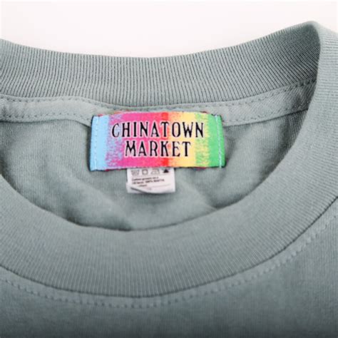 Chinatown Market “Born Again Christian Dior” shirt 